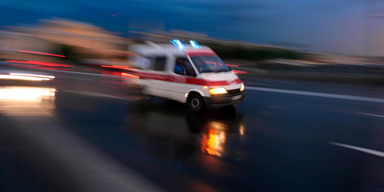 Ambulance car speeding, blurred motion